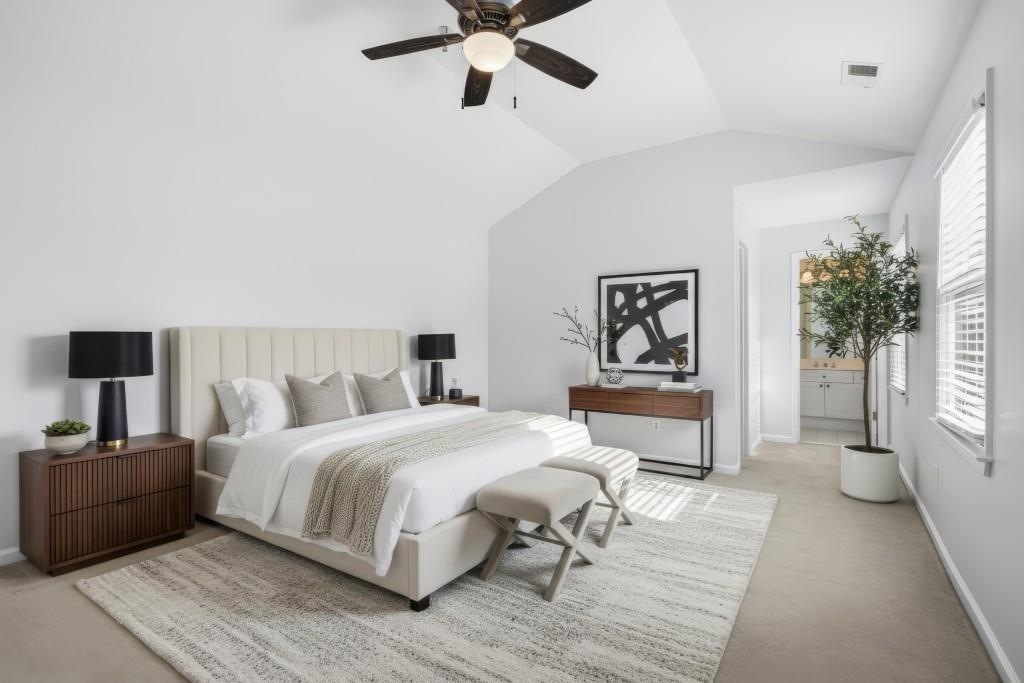 1287 Harris Commons Place Roswell, GA 30076 - Photo 14 of 25 a bedroom with a large bed and a chandelier