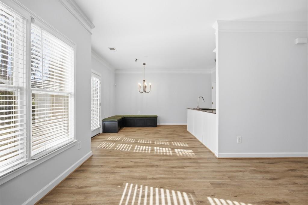 1287 Harris Commons Place Roswell, GA 30076 - Photo 5 of 25 a bedroom with a bed and a window