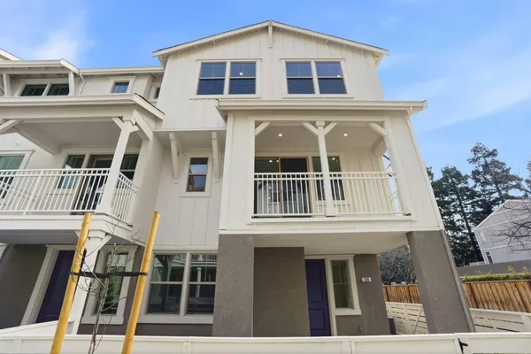 a front view of a house with a porch
