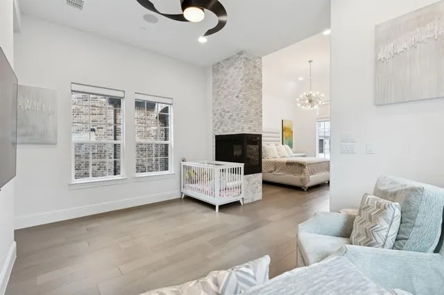 a living room with furniture or couch and a flat screen tv
