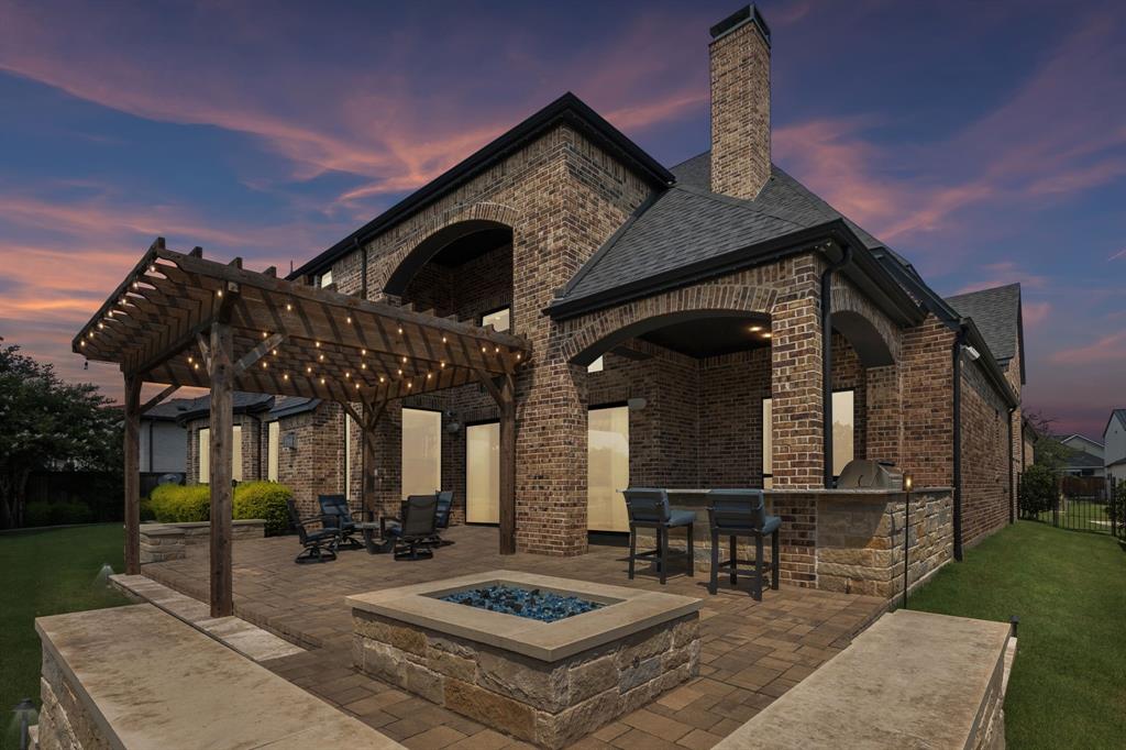 818 Brett Drive Allen, TX 75013 - Photo 28 of 28 a front view of a house with garden