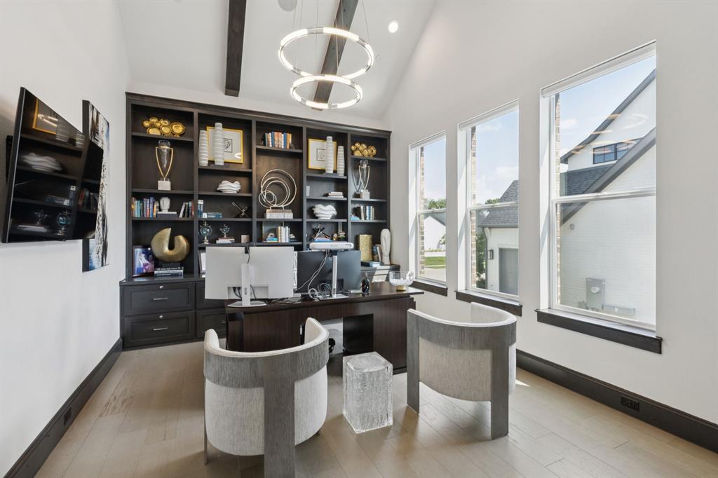 818 Brett Drive Allen, TX 75013 - Photo 7 of 28 a dining room with furniture and a floor to ceiling window