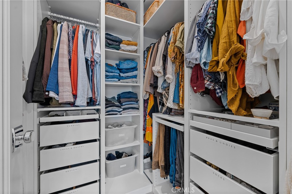 185 Sash Irvine, CA 92618 - Photo 12 of 29 a view of walk in closet with clothes and shoes