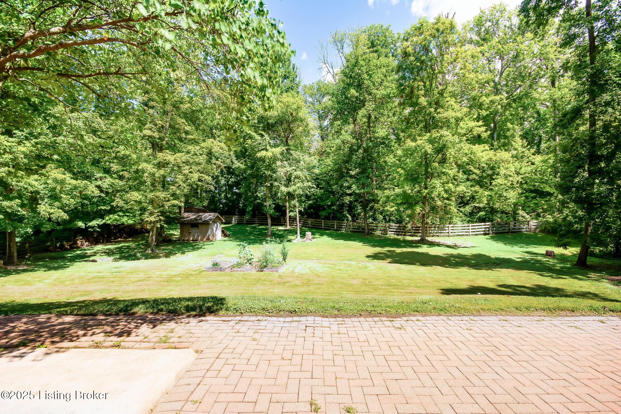9611 Fairground Road Louisville, KY 40291 - Photo 47 of 57 Rear patio over looking your stunning acreage right in the heart of JTown.