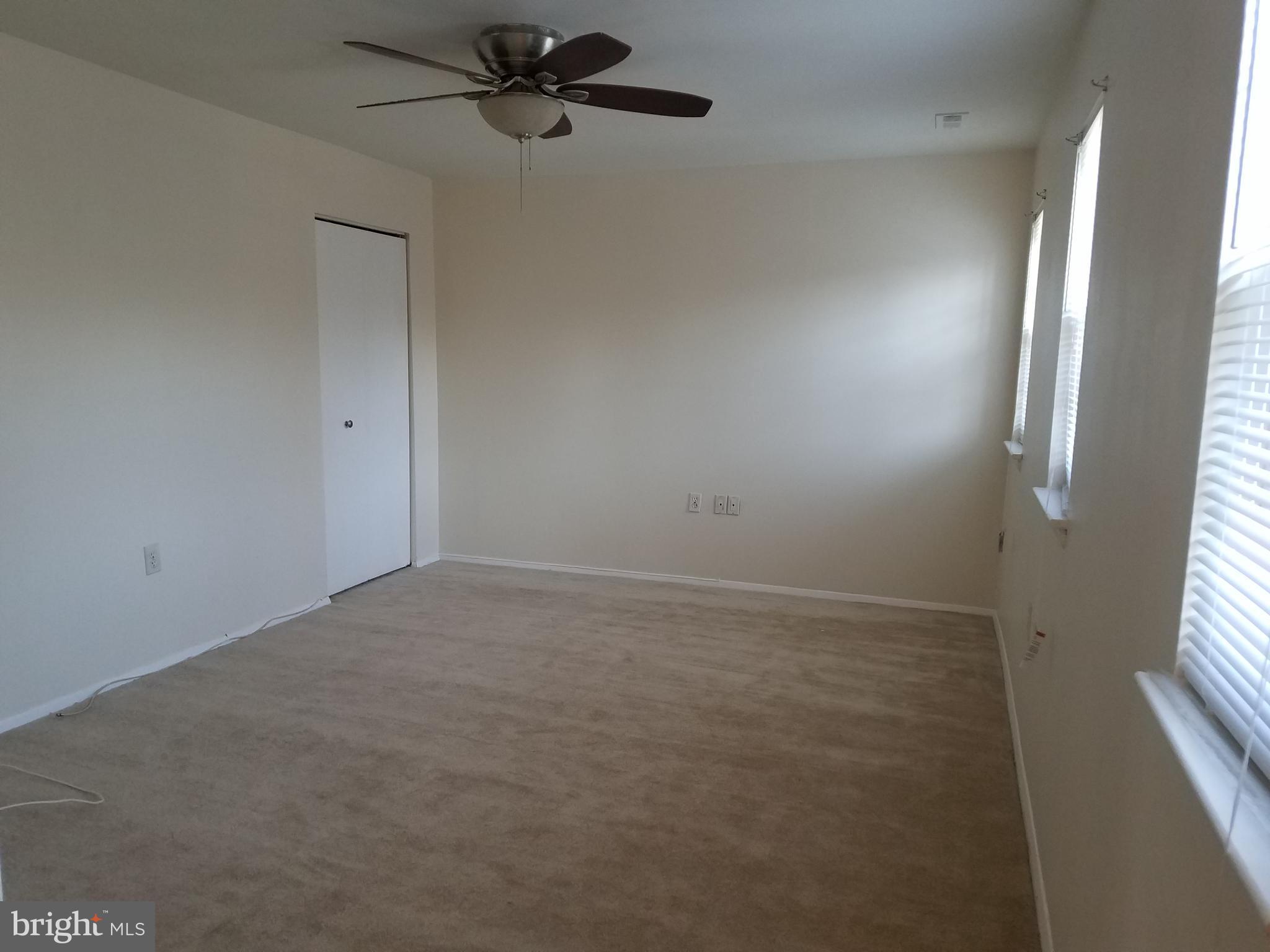 8024 Sandy Spring Road Laurel, MD 20707 - Photo 10 of 21 a view of an empty room and a window