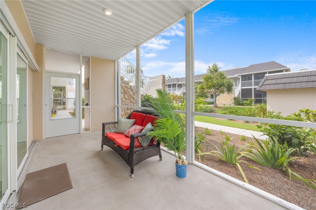 601 Periwinkle Way, Unit D1 Sanibel, FL 33957 - Photo 21 of 25 a garden view with a seating space