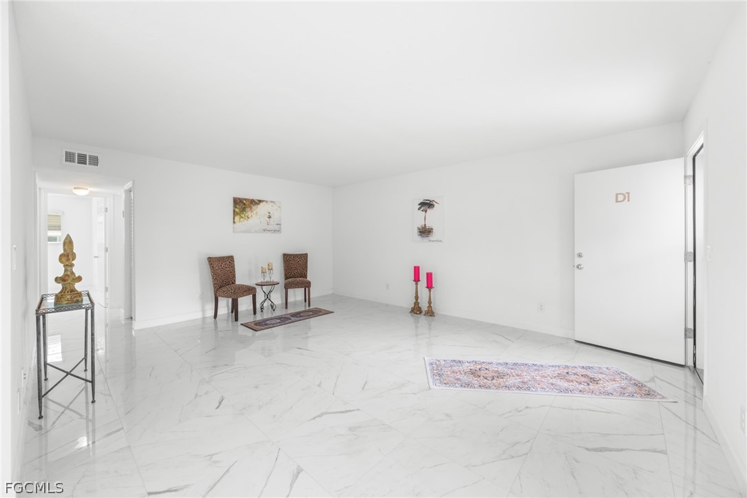 601 Periwinkle Way, Unit D1 Sanibel, FL 33957 - Photo 3 of 25 a view of livingroom with furniture and windows
