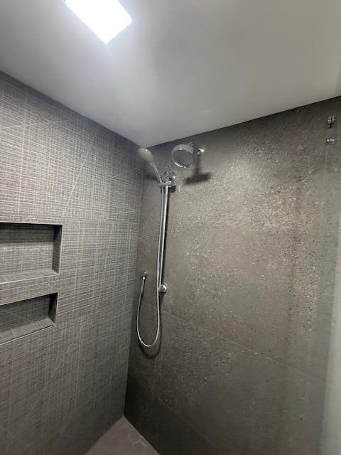 5520 North Ocean Boulevard, Unit 111 Ocean Ridge, FL 33435 - Photo 23 of 63 tiled shower with dual shower heads