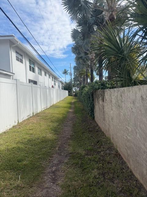 5520 North Ocean Boulevard, Unit 111 Ocean Ridge, FL 33435 - Photo 45 of 63 path to private beach entrance