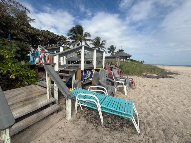 5520 North Ocean Boulevard, Unit 111 Ocean Ridge, FL 33435 - Photo 51 of 63 storage under deck for chairs and kayaks
