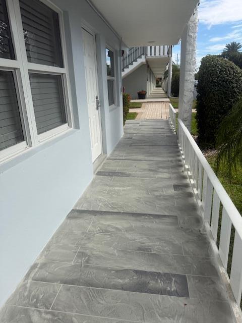 5520 North Ocean Boulevard, Unit 111 Ocean Ridge, FL 33435 - Photo 56 of 63 new tiled walkway