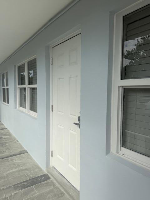 5520 North Ocean Boulevard, Unit 111 Ocean Ridge, FL 33435 - Photo 57 of 63 keypad front door