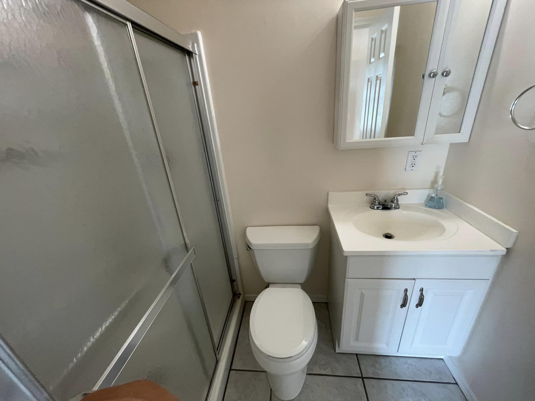 688 Roberts Drive DeFuniak Springs, FL 32433 - Photo 11 of 19 a bathroom with a sink and a toilet