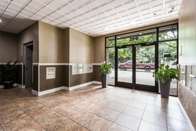 a view of an empty room with a balcony