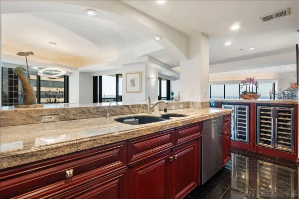 a kitchen with a sink and cabinets