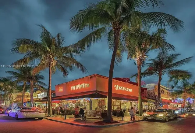 a view of a street with cars