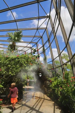 a front view of building with retail shops