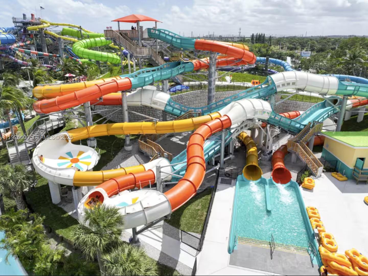 909 Northeast 7th Street Pompano Beach, FL 33060 - Photo 31 of 37 an aerial view of a house with a garden and pool