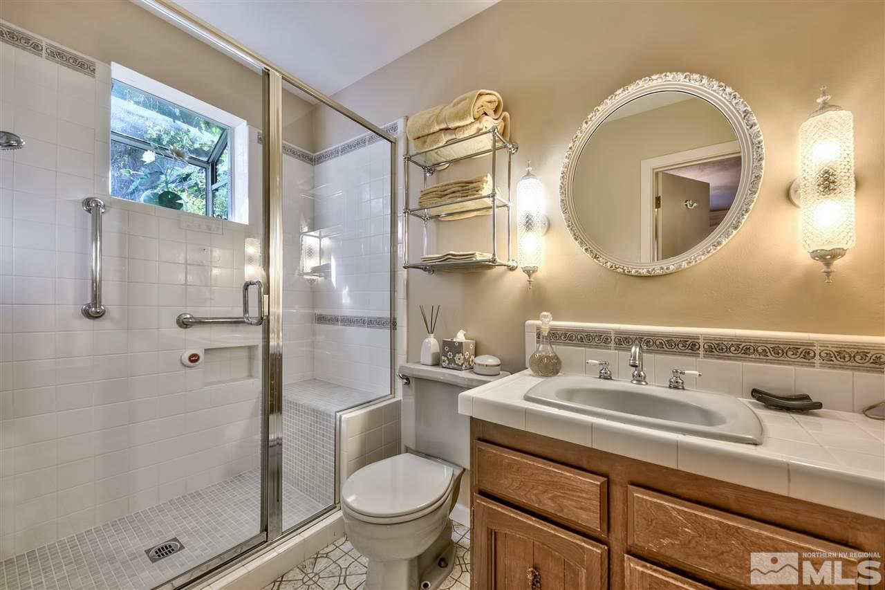 3550 Lamay Lane Reno, NV 89511 - Photo 22 of 25 a bathroom with a sink and a mirror