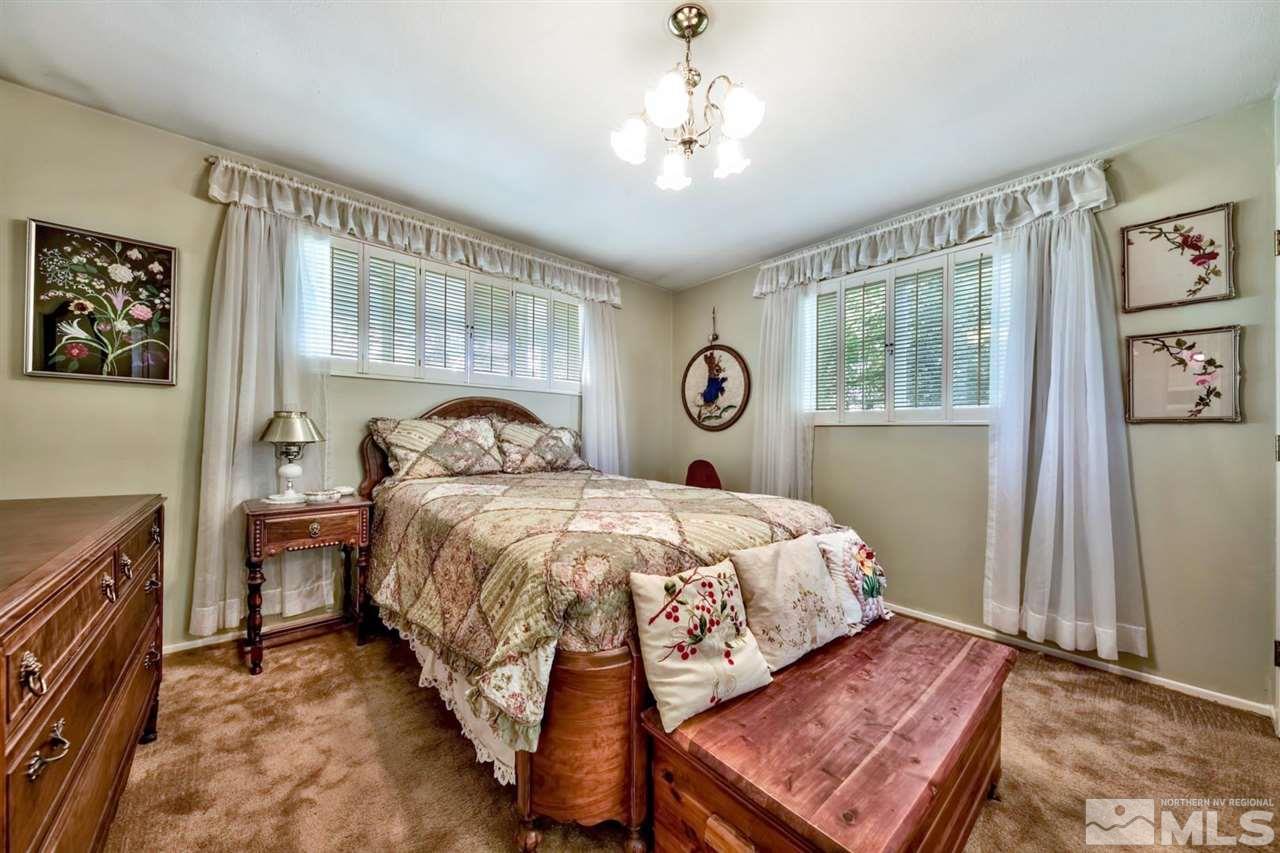 3550 Lamay Lane Reno, NV 89511 - Photo 25 of 25 a bedroom with a bed and a window
