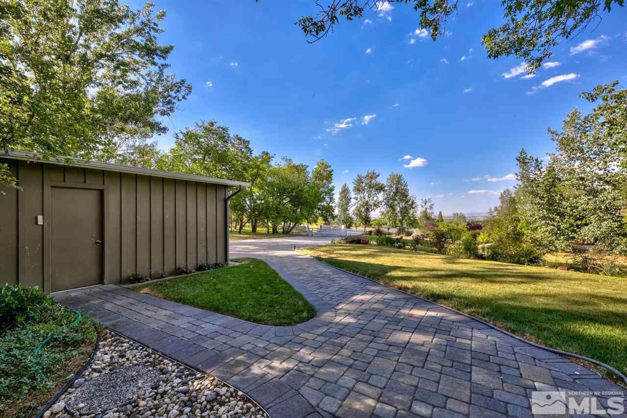3550 Lamay Lane Reno, NV 89511 - Photo 9 of 25 a view of a swimming pool with an outdoor space and seating area
