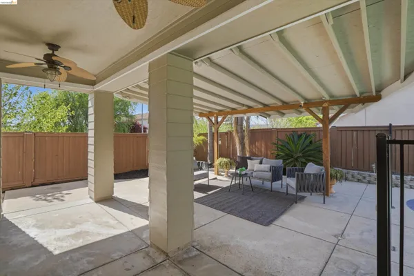 a view of a swimming pool with a patio