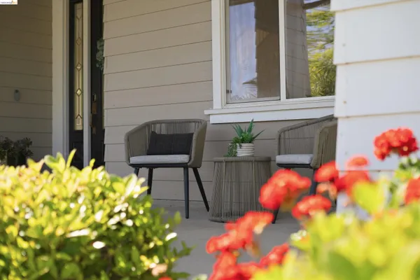 a backyard of a house with seating space
