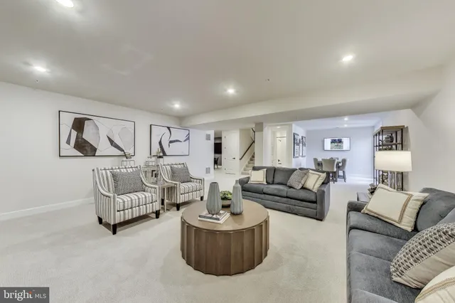 a living room with furniture and a couch