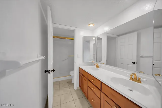 a bathroom with a sink a mirror and a bathtub