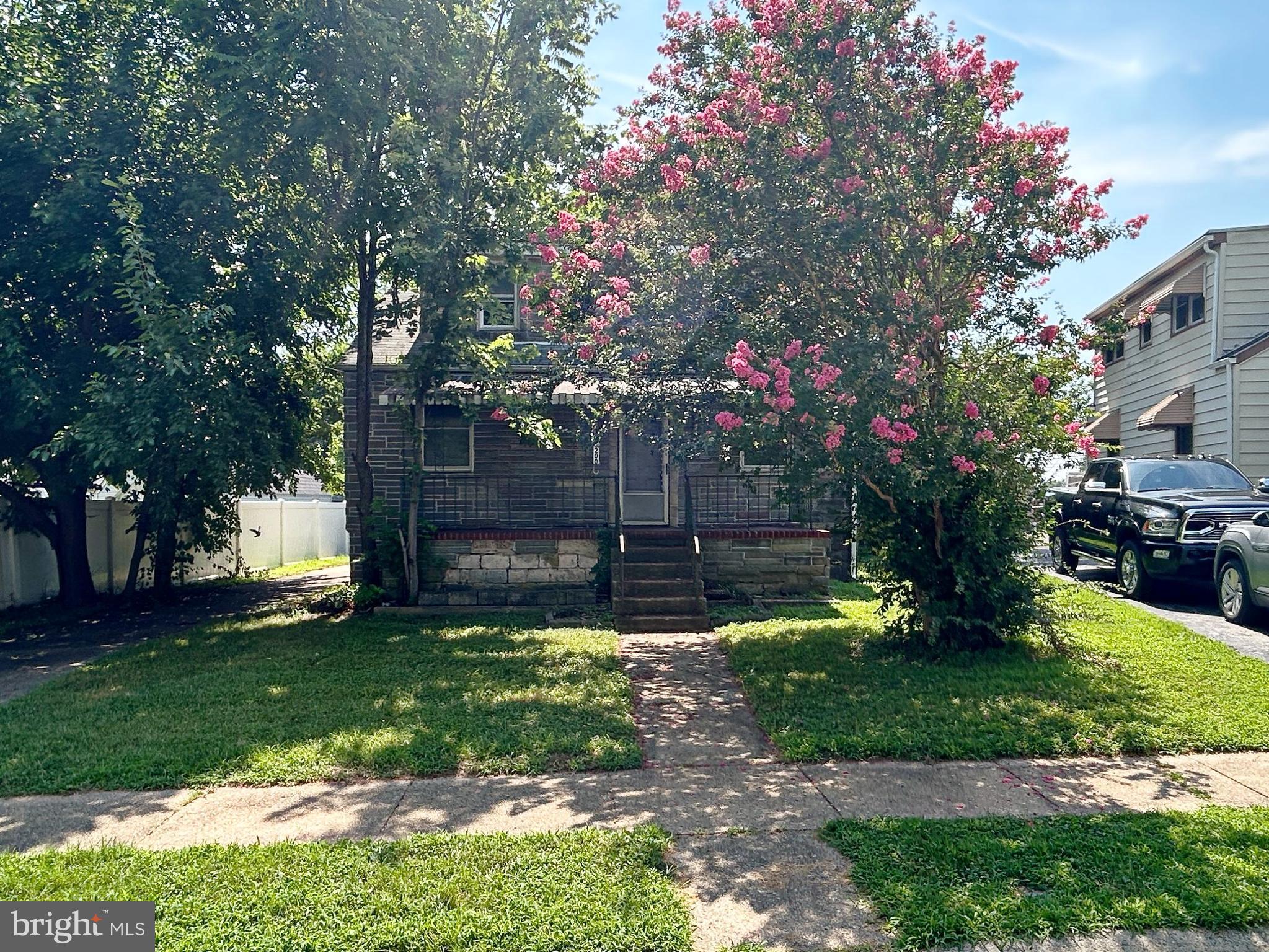 200 Pinewood Road Dundalk, MD 21222 - Photo 1 of 14 a front view of a house with garden