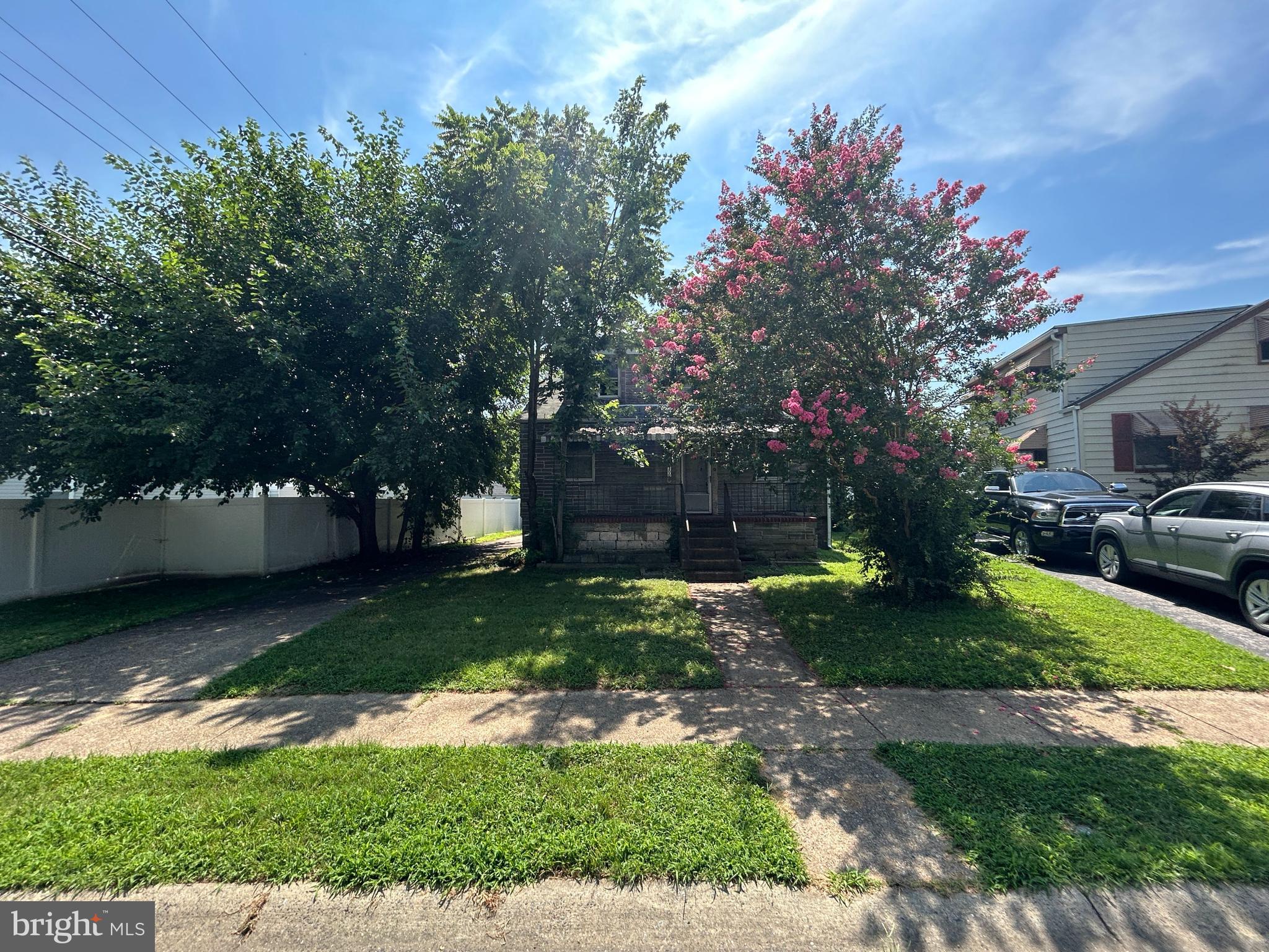 200 Pinewood Road Dundalk, MD 21222 - Photo 2 of 14 a backyard of a house with lots of green space