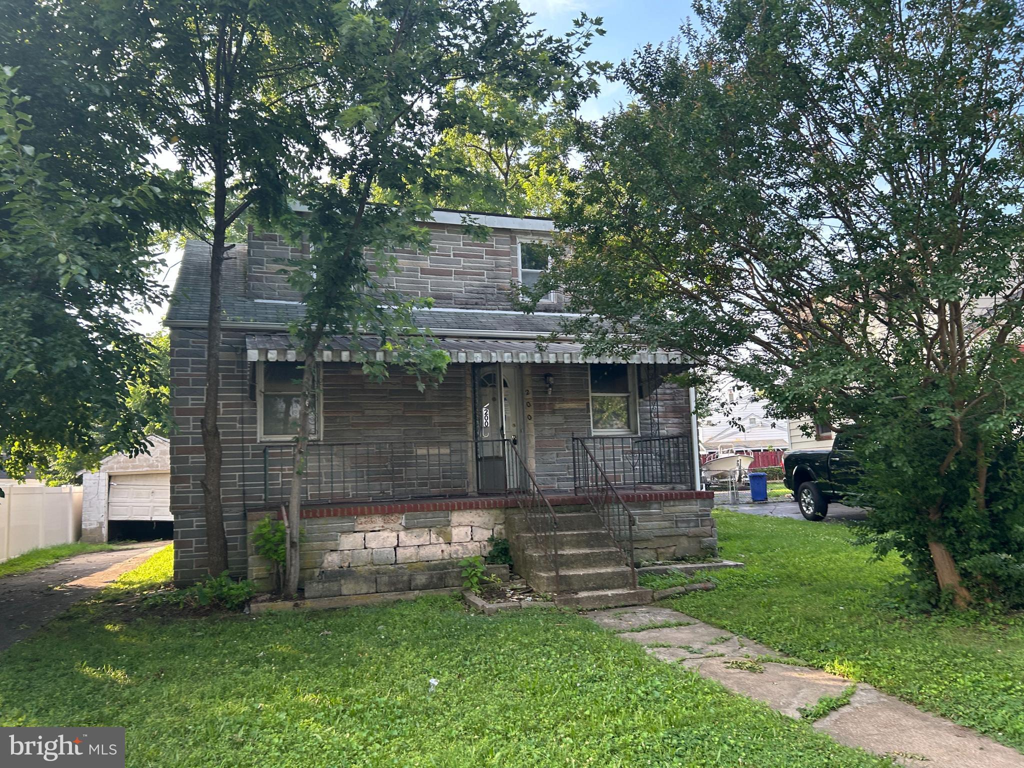 200 Pinewood Road Dundalk, MD 21222 - Photo 3 of 14 front view of a house with a yard