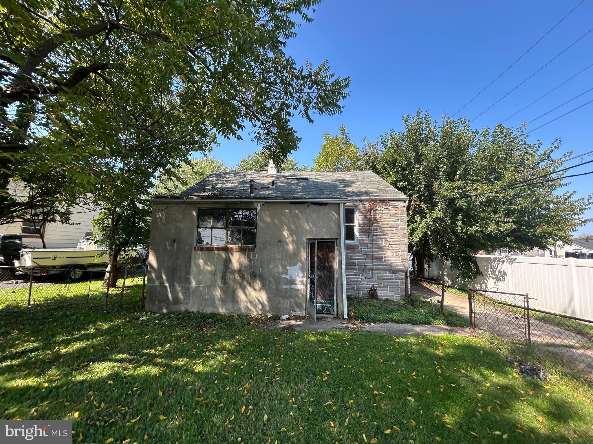 200 Pinewood Road Dundalk, MD 21222 - Photo 4 of 14 a front view of a house with a garden