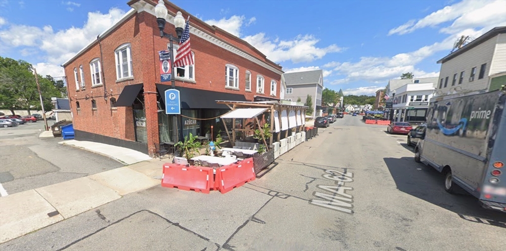 a view of a street with cars