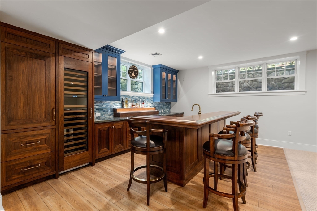 22 Temple Road Wellesley, MA 02482 - Photo 29 of 41 a view of a dining room with furniture and window