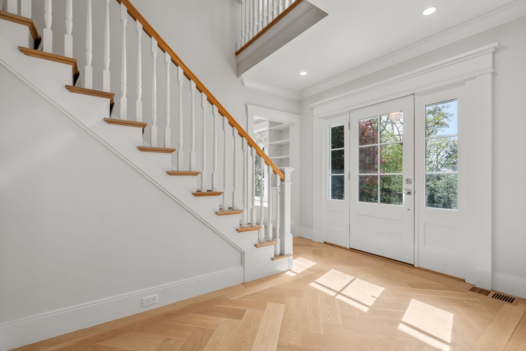 22 Temple Road Wellesley, MA 02482 - Photo 3 of 41 a view of an entryway with staircase