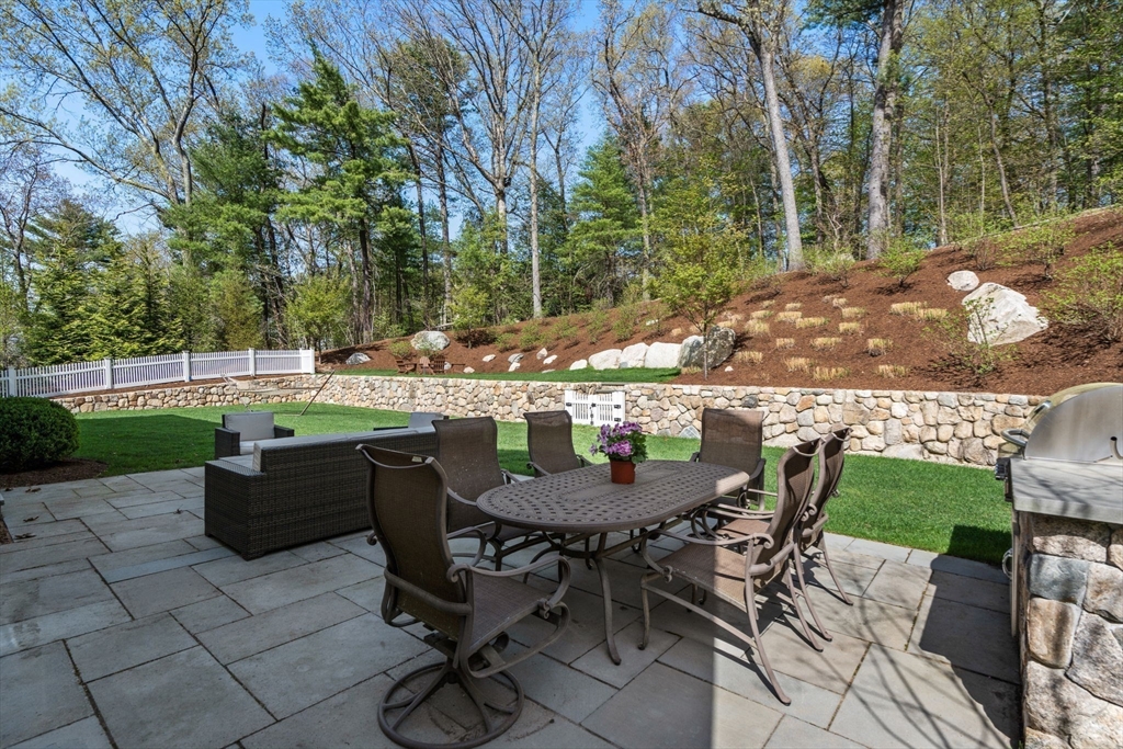 22 Temple Road Wellesley, MA 02482 - Photo 36 of 41 a view of an outdoor sitting area with furniture in backyard