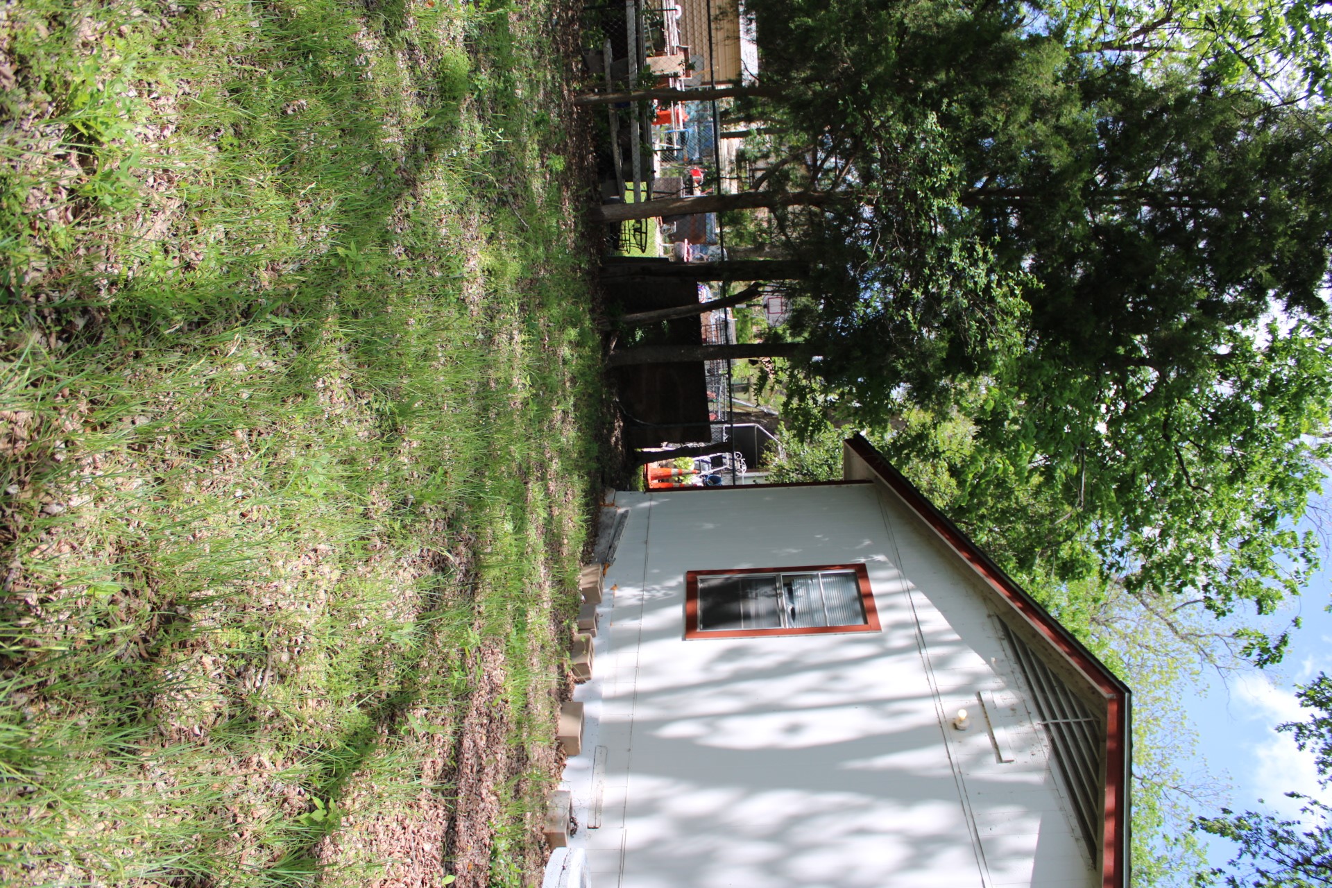 3017 Lyons Road Austin, TX 78702 - Photo 5 of 16 a view of a house with a yard