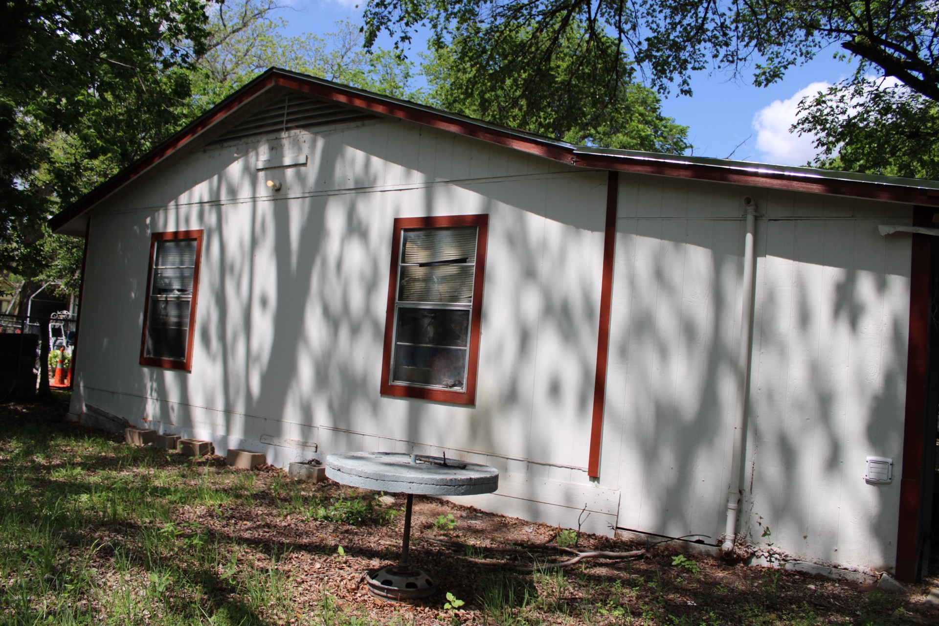3017 Lyons Road Austin, TX 78702 - Photo 8 of 16 a front view of a house with garden