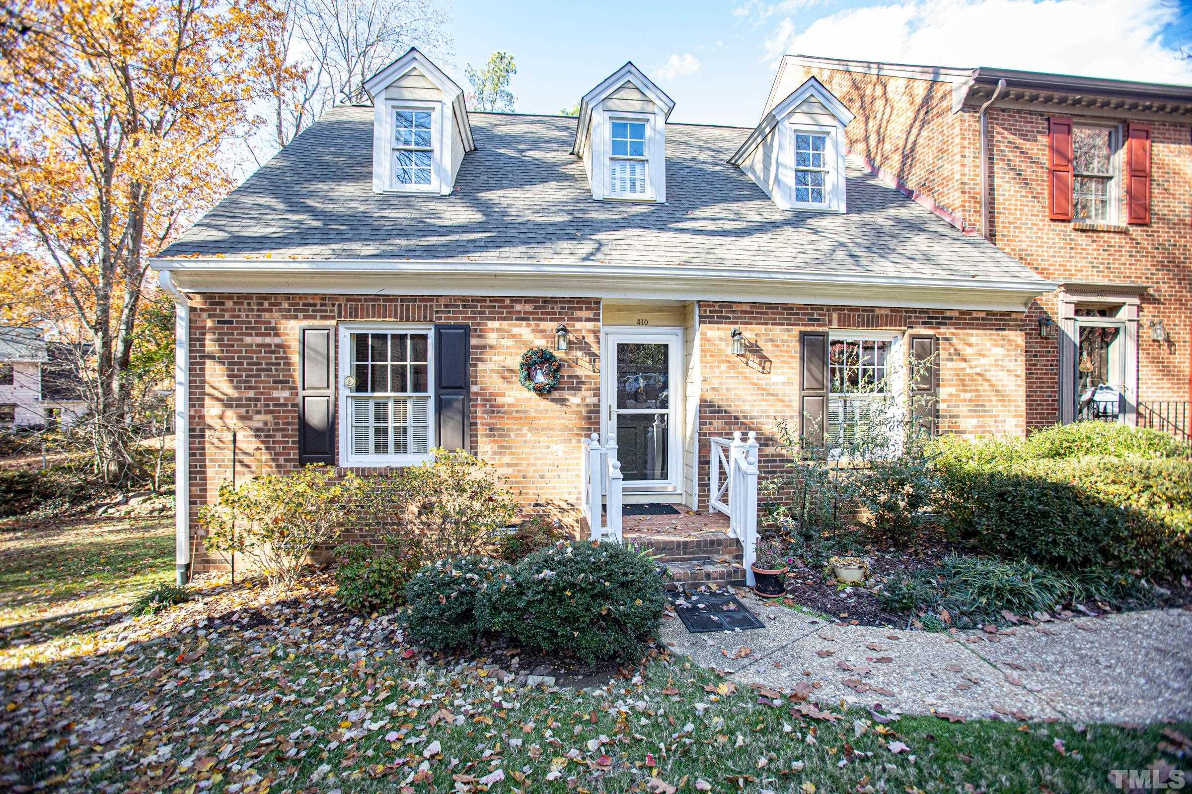 410 Weathergreen Drive Raleigh, NC 27615 - Photo 1 of 44 a front view of a house with garden