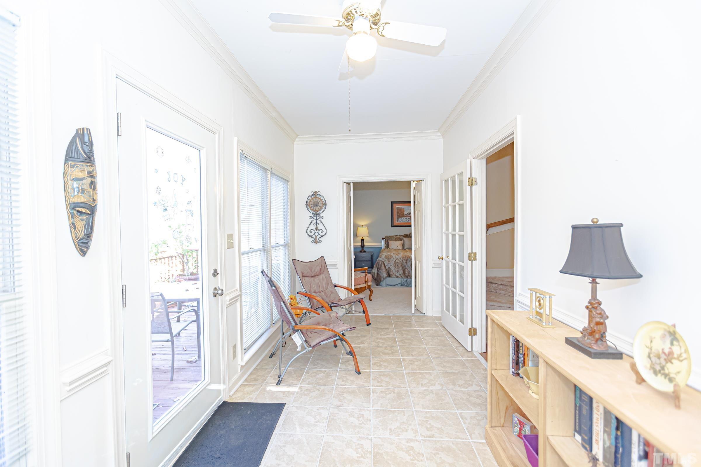 410 Weathergreen Drive Raleigh, NC 27615 - Photo 19 of 44 a living room with furniture and a window