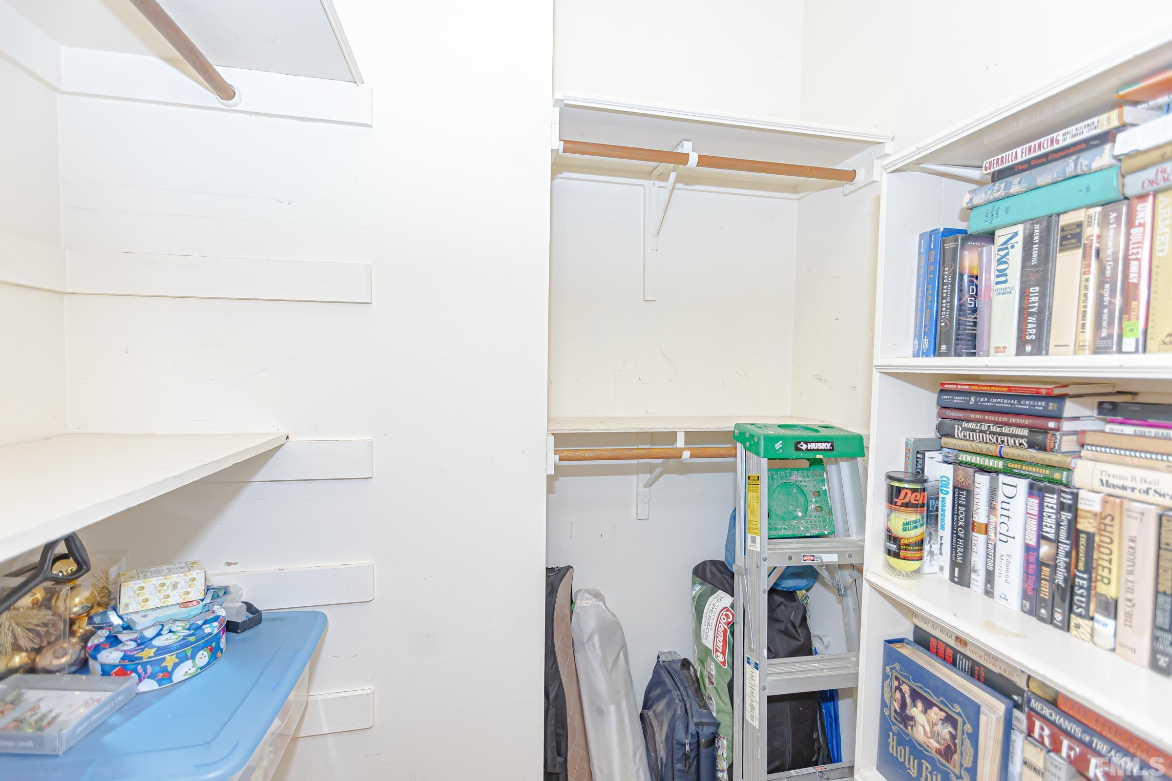 410 Weathergreen Drive Raleigh, NC 27615 - Photo 24 of 44 a view of storage and utility room with washer and dryer