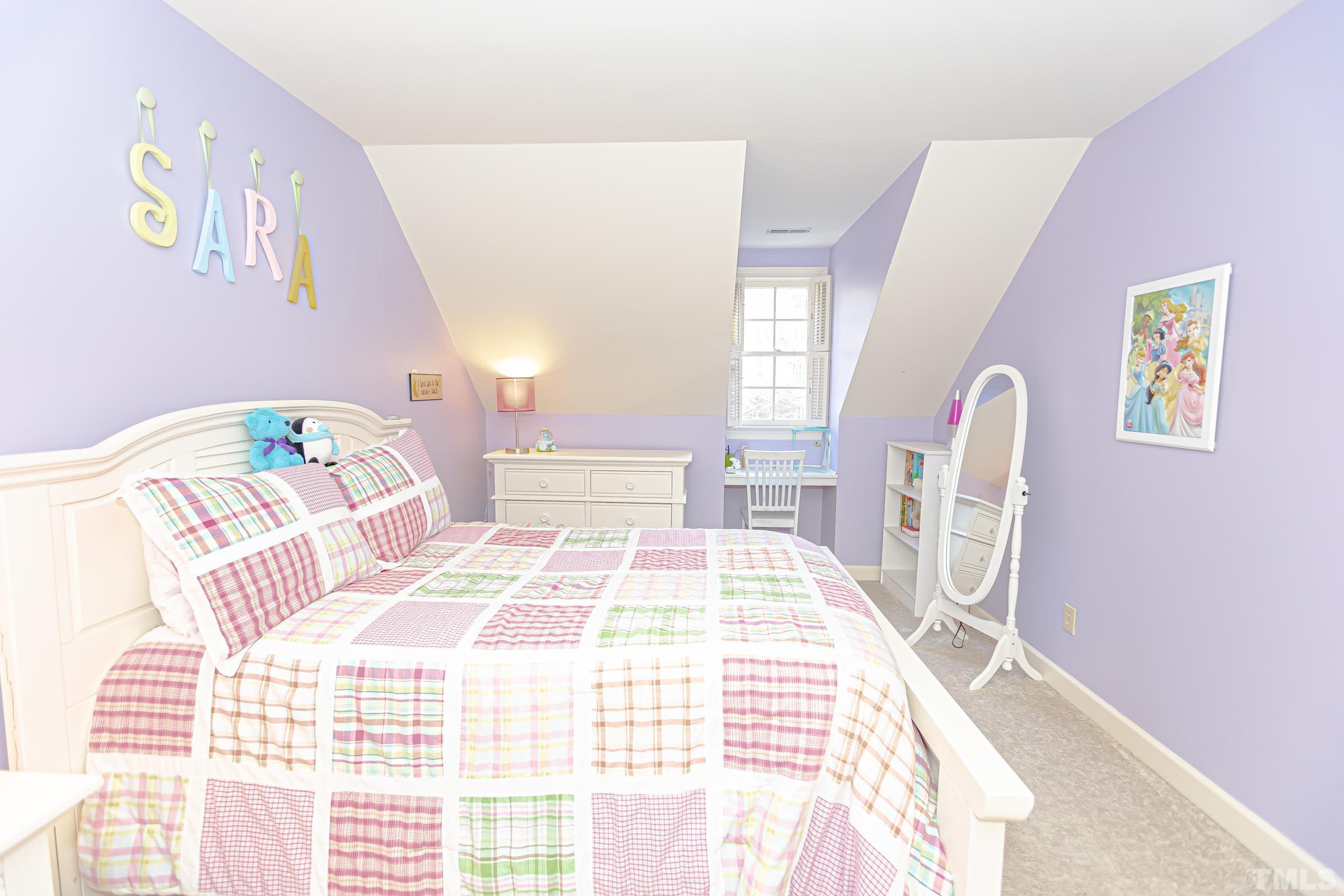 410 Weathergreen Drive Raleigh, NC 27615 - Photo 31 of 44 a bedroom with a bed and wooden floor