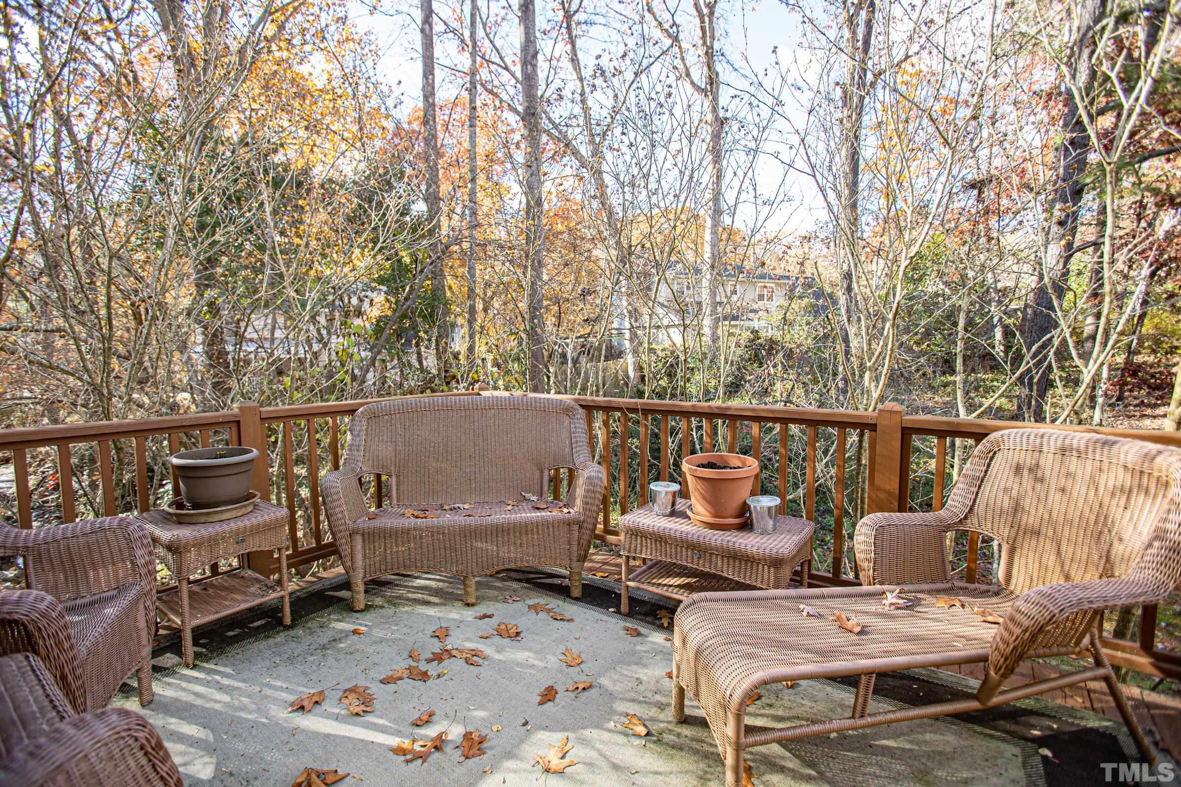 410 Weathergreen Drive Raleigh, NC 27615 - Photo 36 of 44 a roof deck with couches and wooden fence