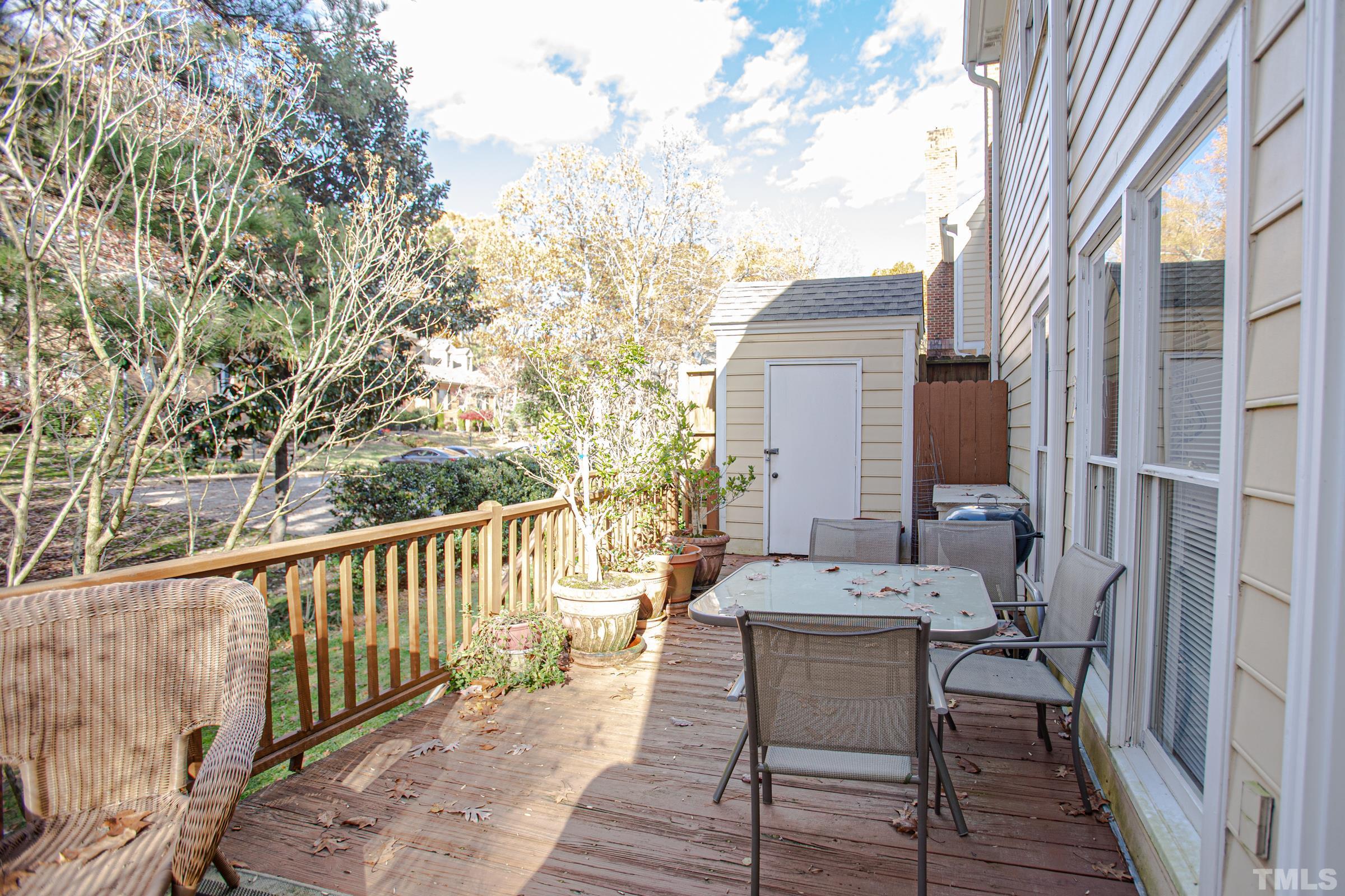 410 Weathergreen Drive Raleigh, NC 27615 - Photo 37 of 44 a view of a patio on wooden deck