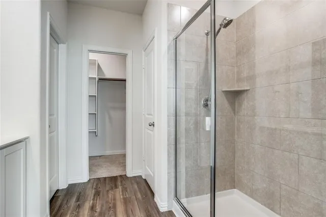 a bathroom with a sink and mirror