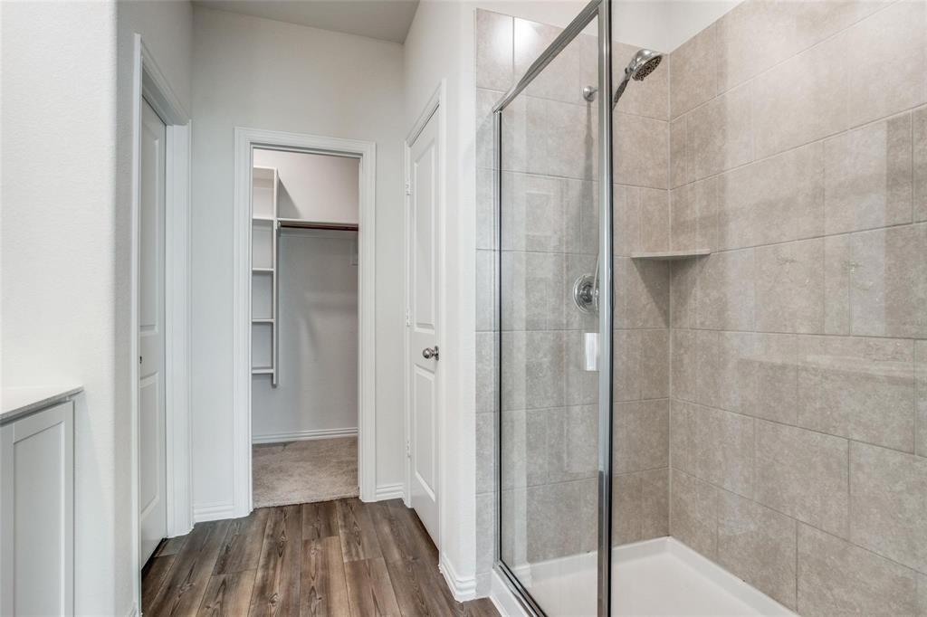 309 Hackberry Street Princeton, TX 75407 - Photo 16 of 28 a view of bathroom with shower