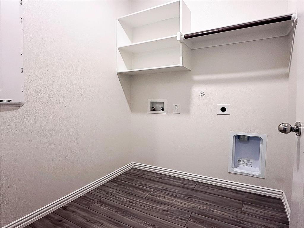 309 Hackberry Street Princeton, TX 75407 - Photo 18 of 28 a view of a small space with wooden floor