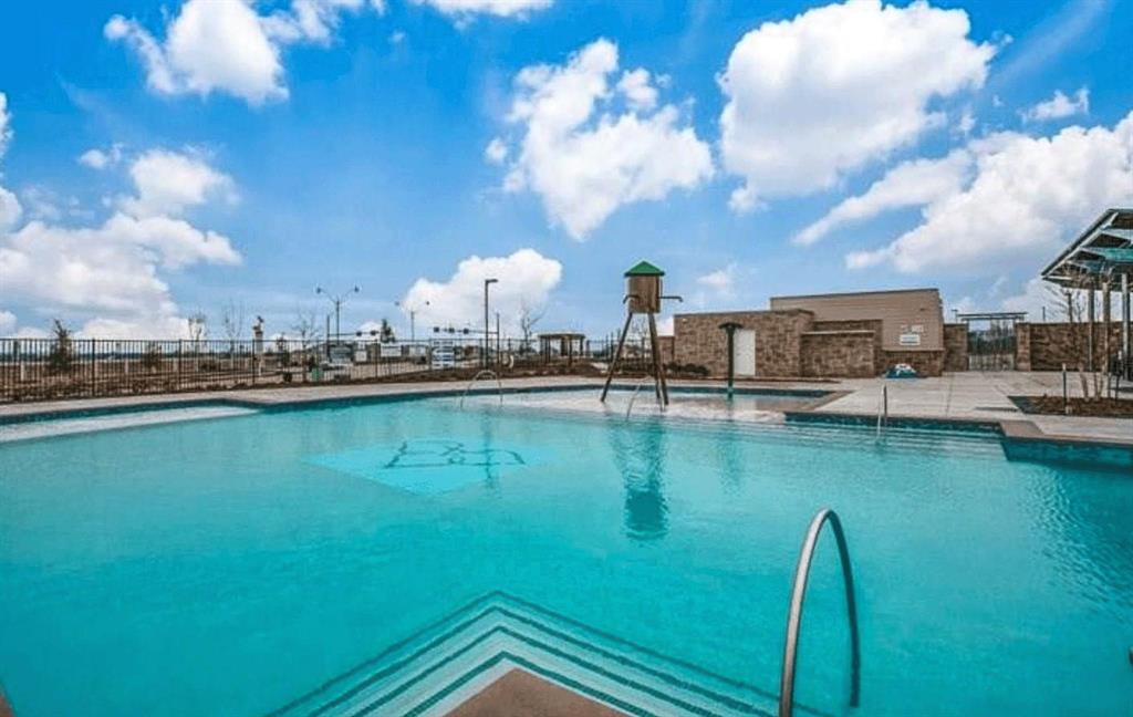 309 Hackberry Street Princeton, TX 75407 - Photo 25 of 28 a view of a lake