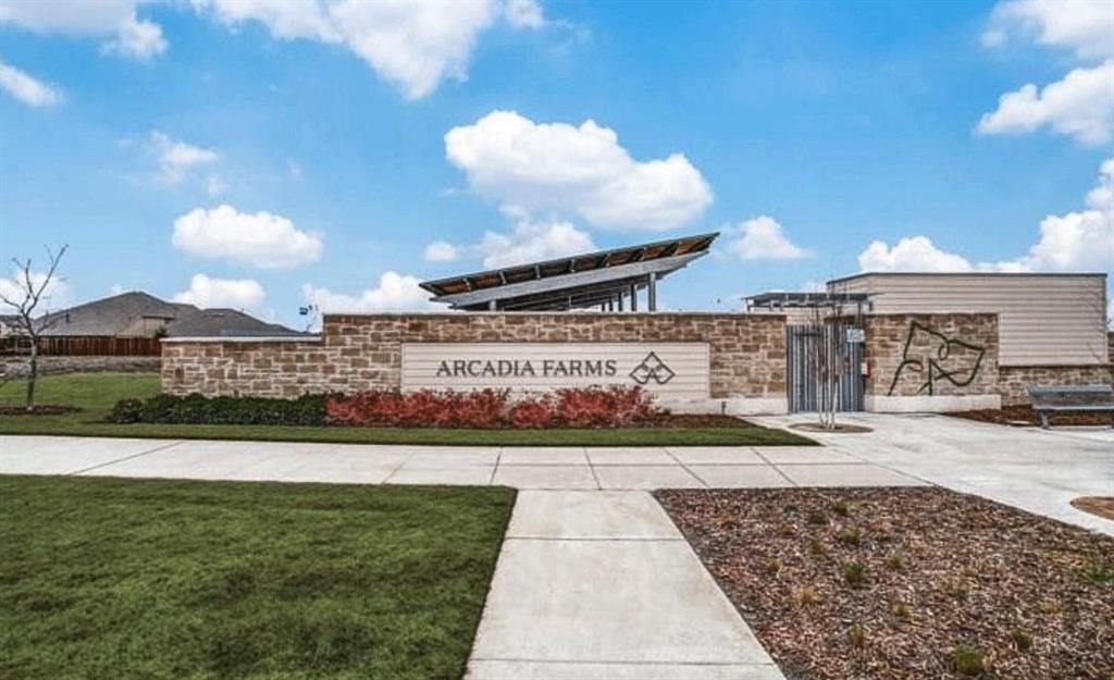 309 Hackberry Street Princeton, TX 75407 - Photo 26 of 28 a view of a street with houses in the background
